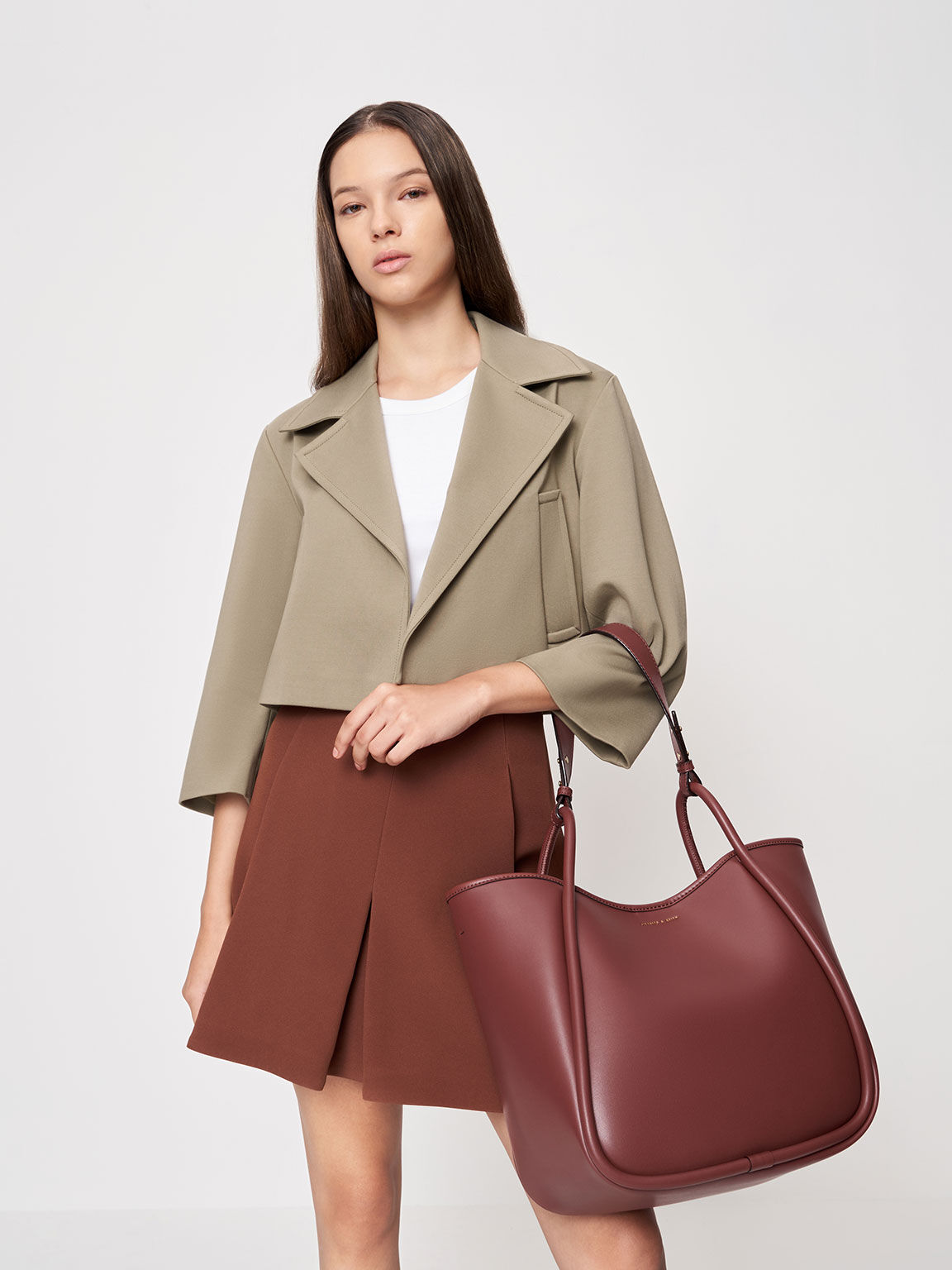 Charles and keith slouchy sling bag hotsell