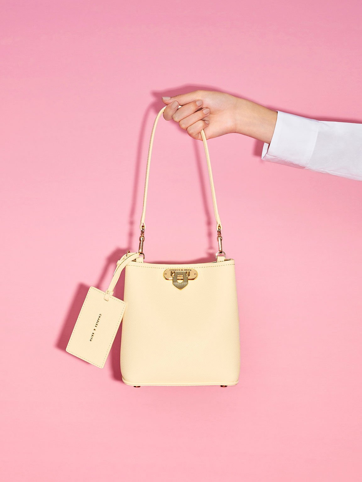 Beige bucket bag on sale