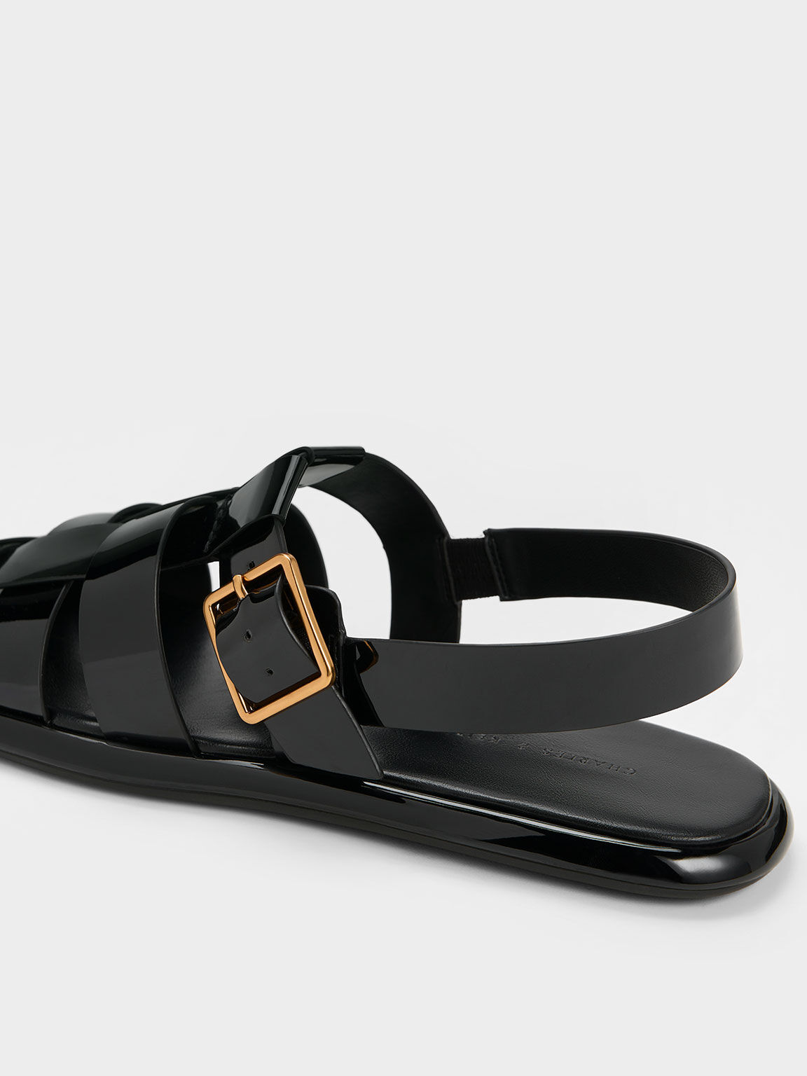 Black patent flip flops top