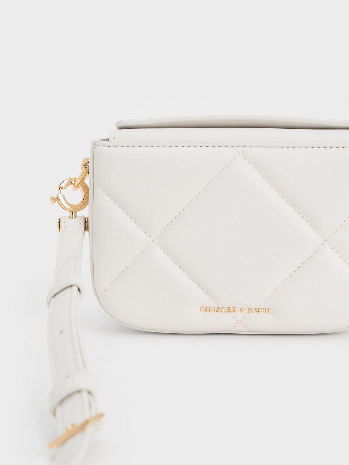 Charles and keith white sling bag online