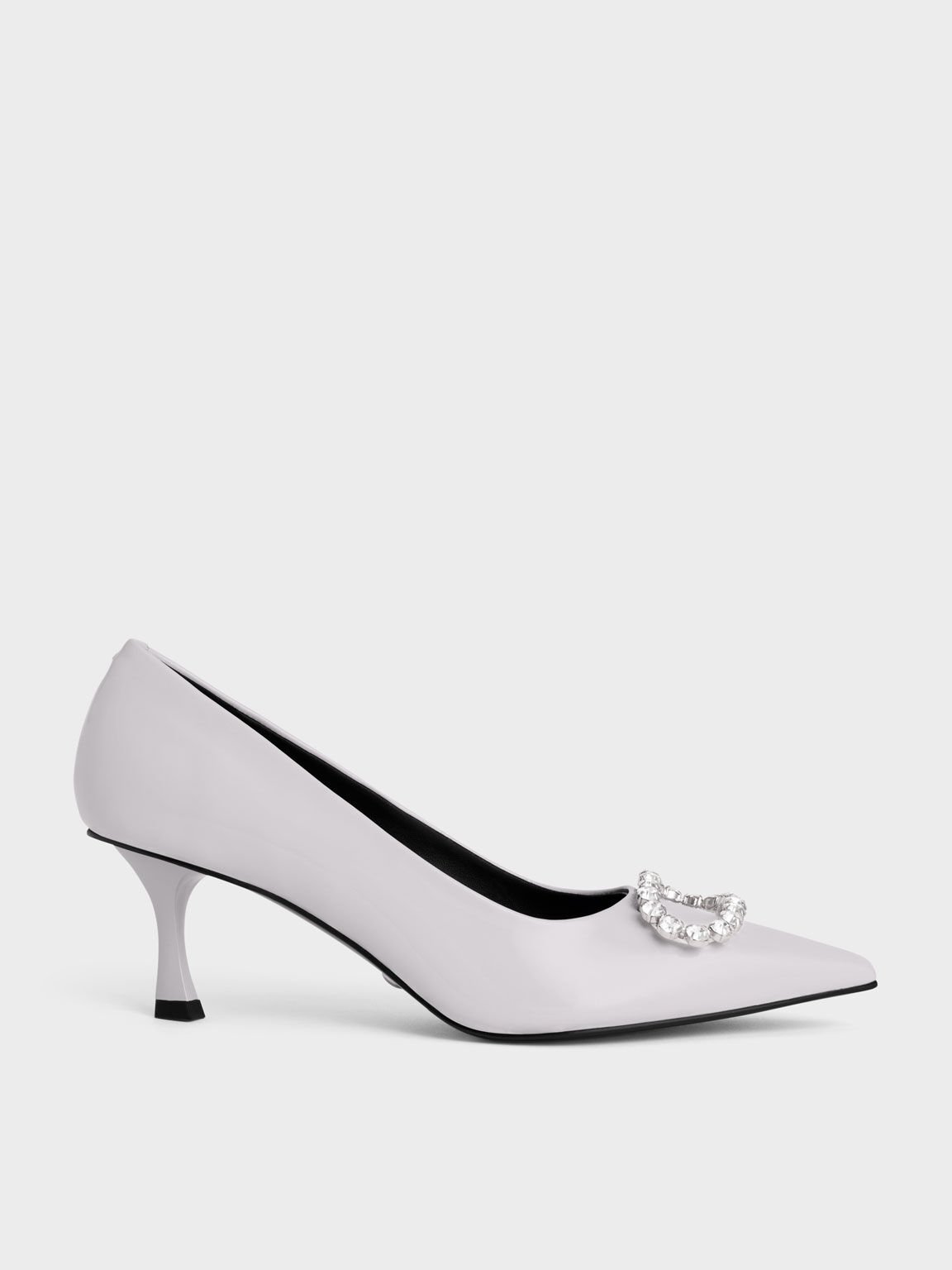 White patent leather pumps top