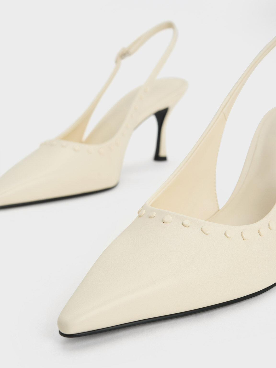 Studded pointed sale slingbacks charles keith