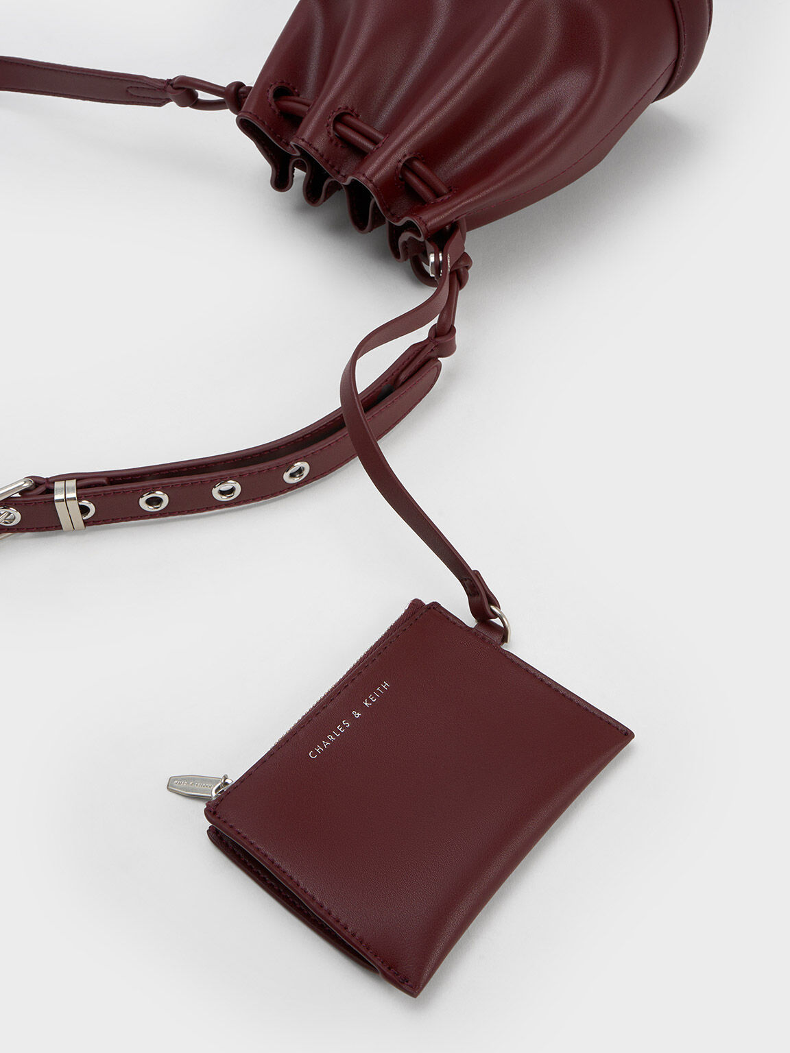 Sling bucket bag best sale
