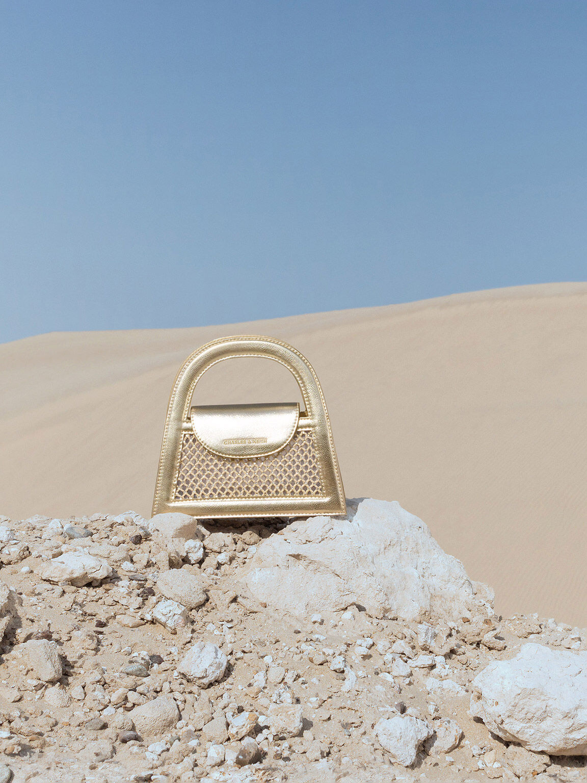 Charles and keith paper bag top clutch