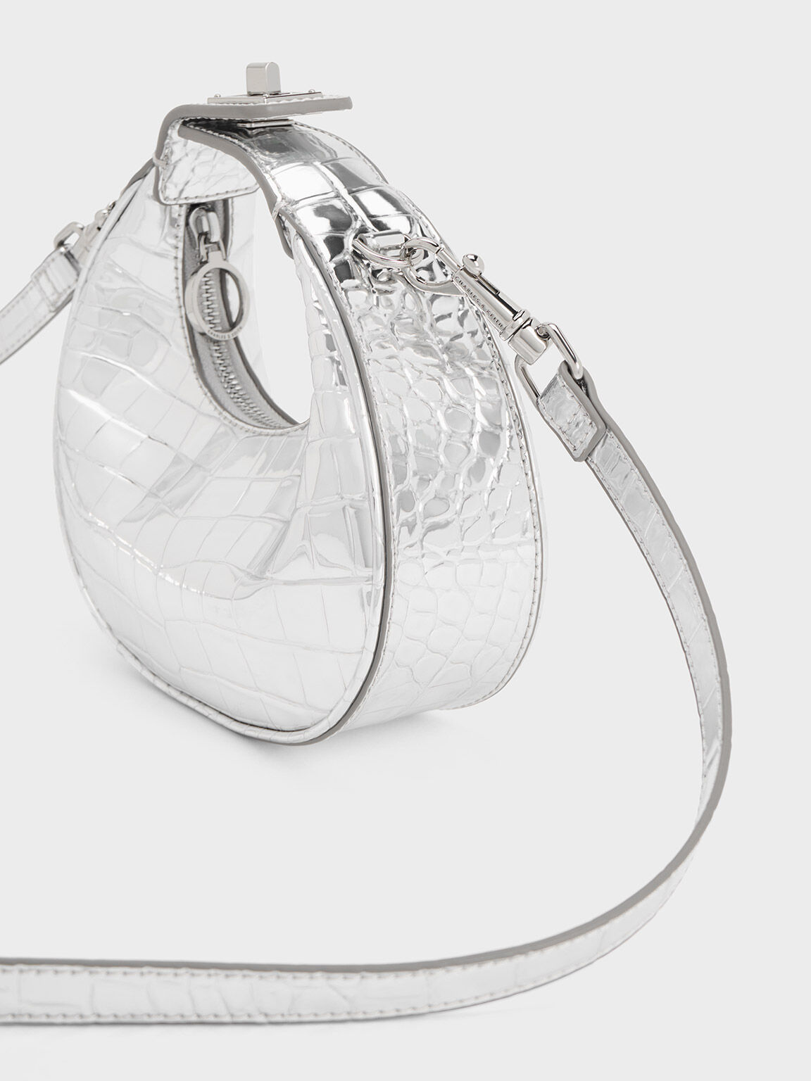 Silver Mini Croc Effect Metallic Moon Bag CHARLES KEITH UK