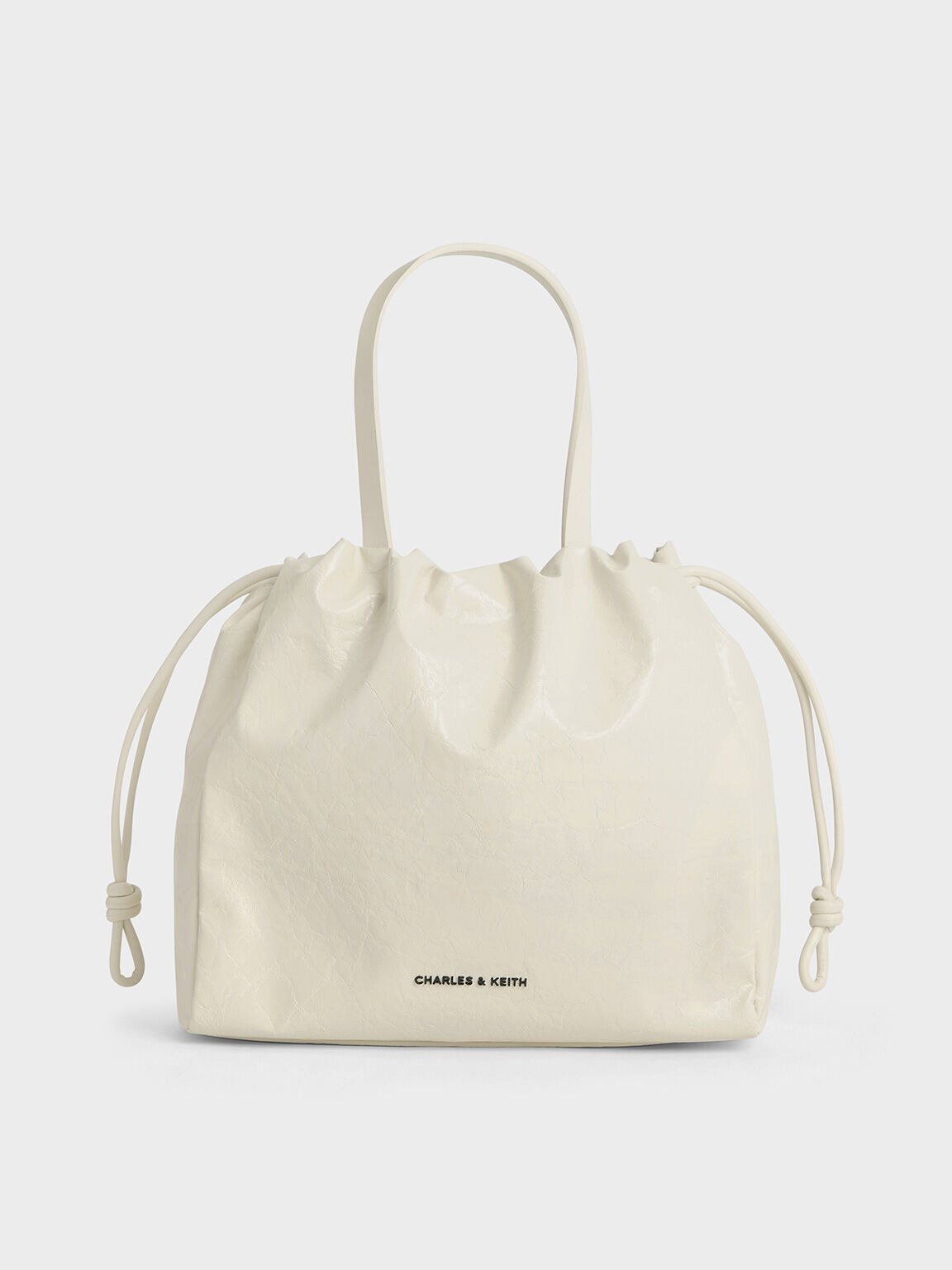 Charles and keith drawstring bag store