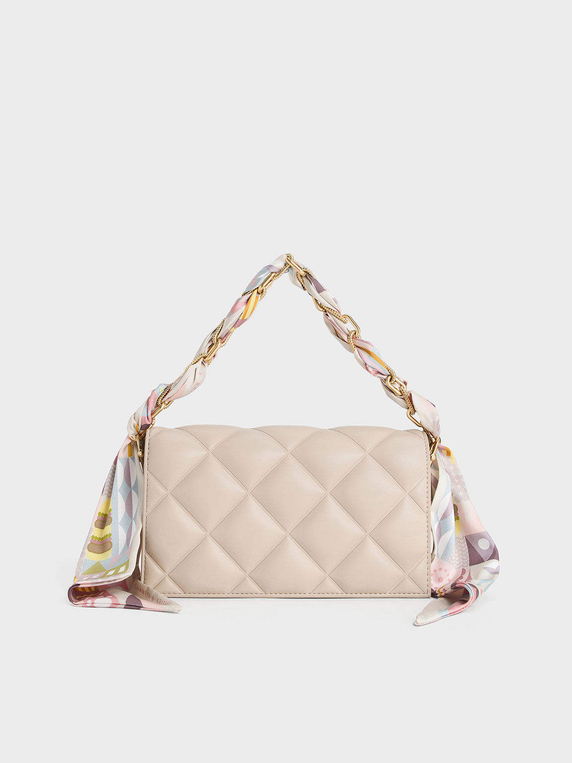 Charles & keith embellished quilted clutch 2025