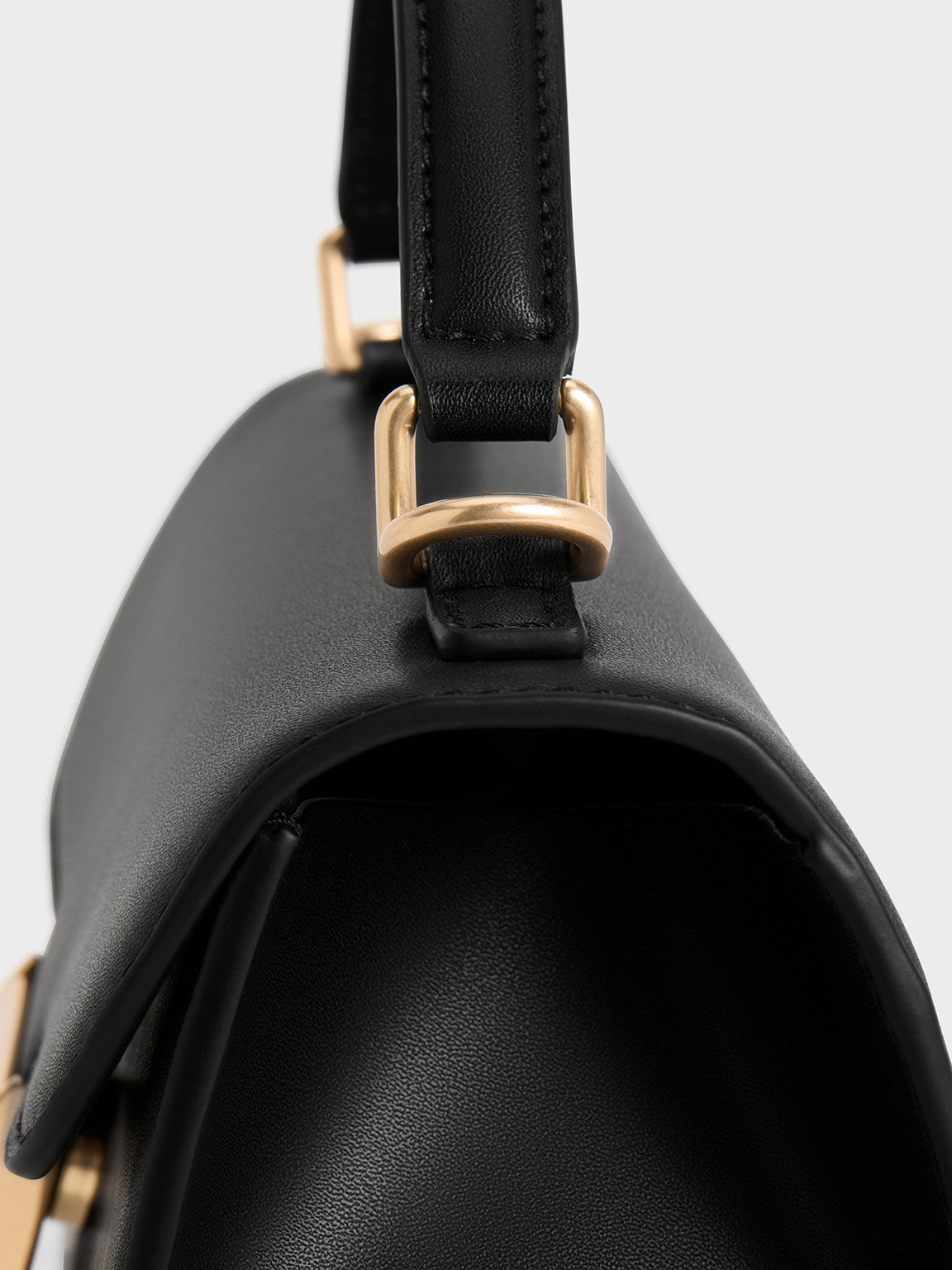 Charles & keith top handle trapeze bag online