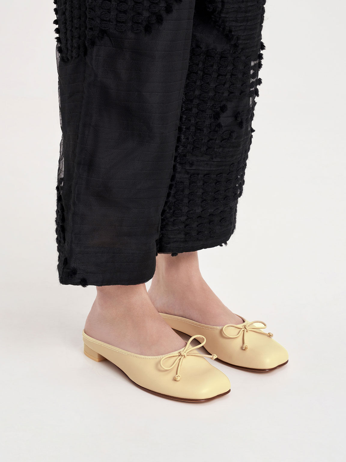 Bow top slip ons