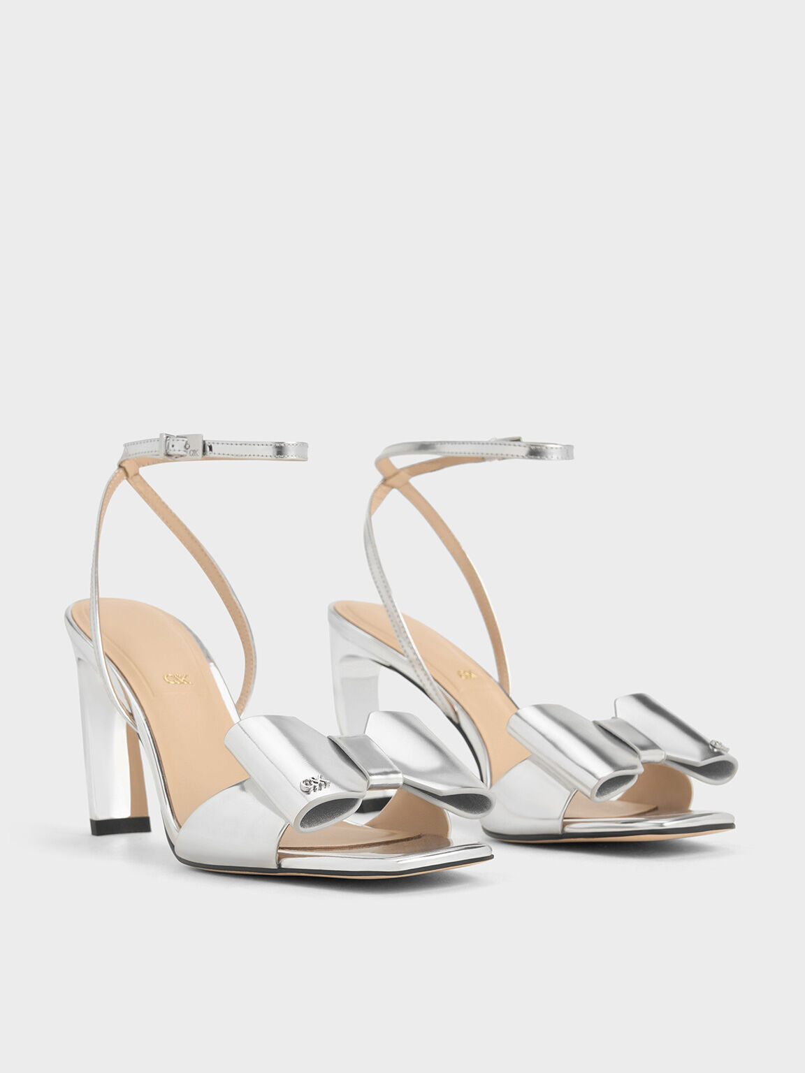 Lu Metallic Leather Bow Blade Heel Sandals Silver