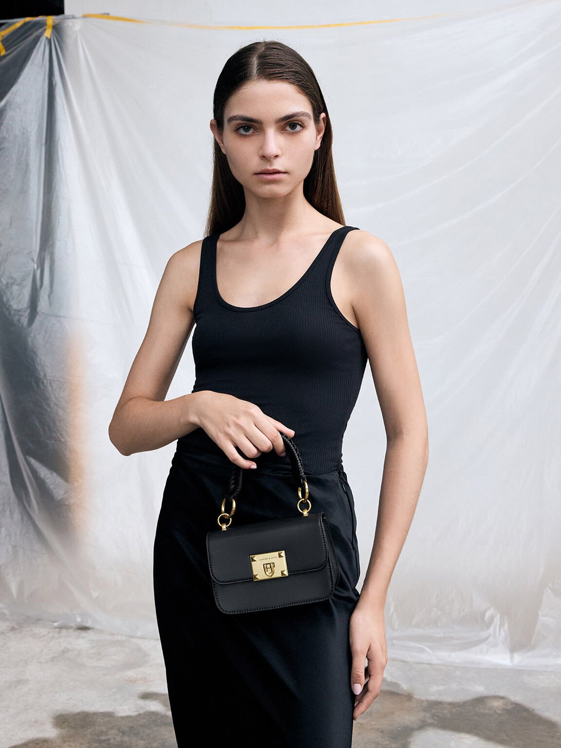 Charles and keith best sale turn lock crossbody bag