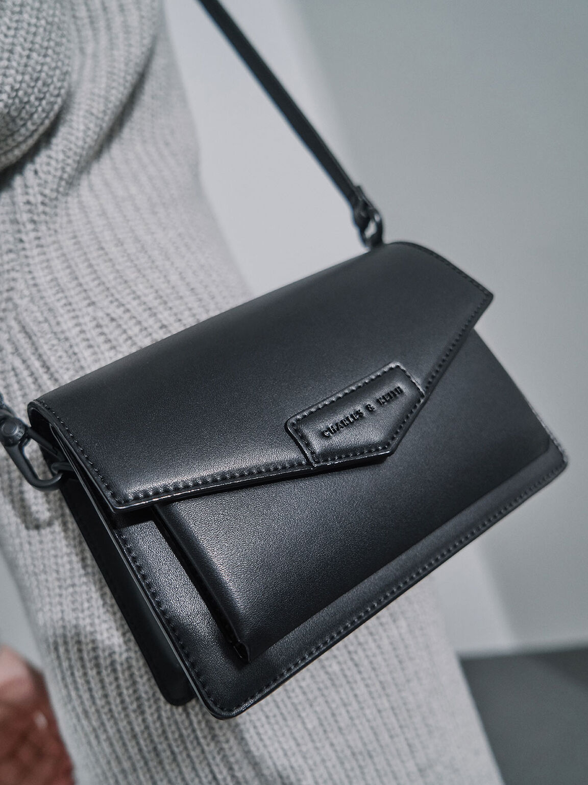 the envelope silver chain crossbody bag black