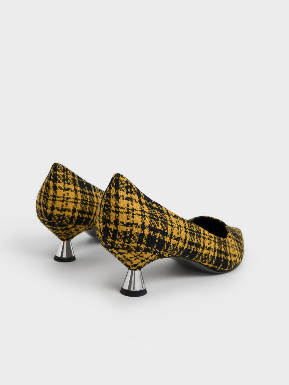 Yellow and discount black pumps