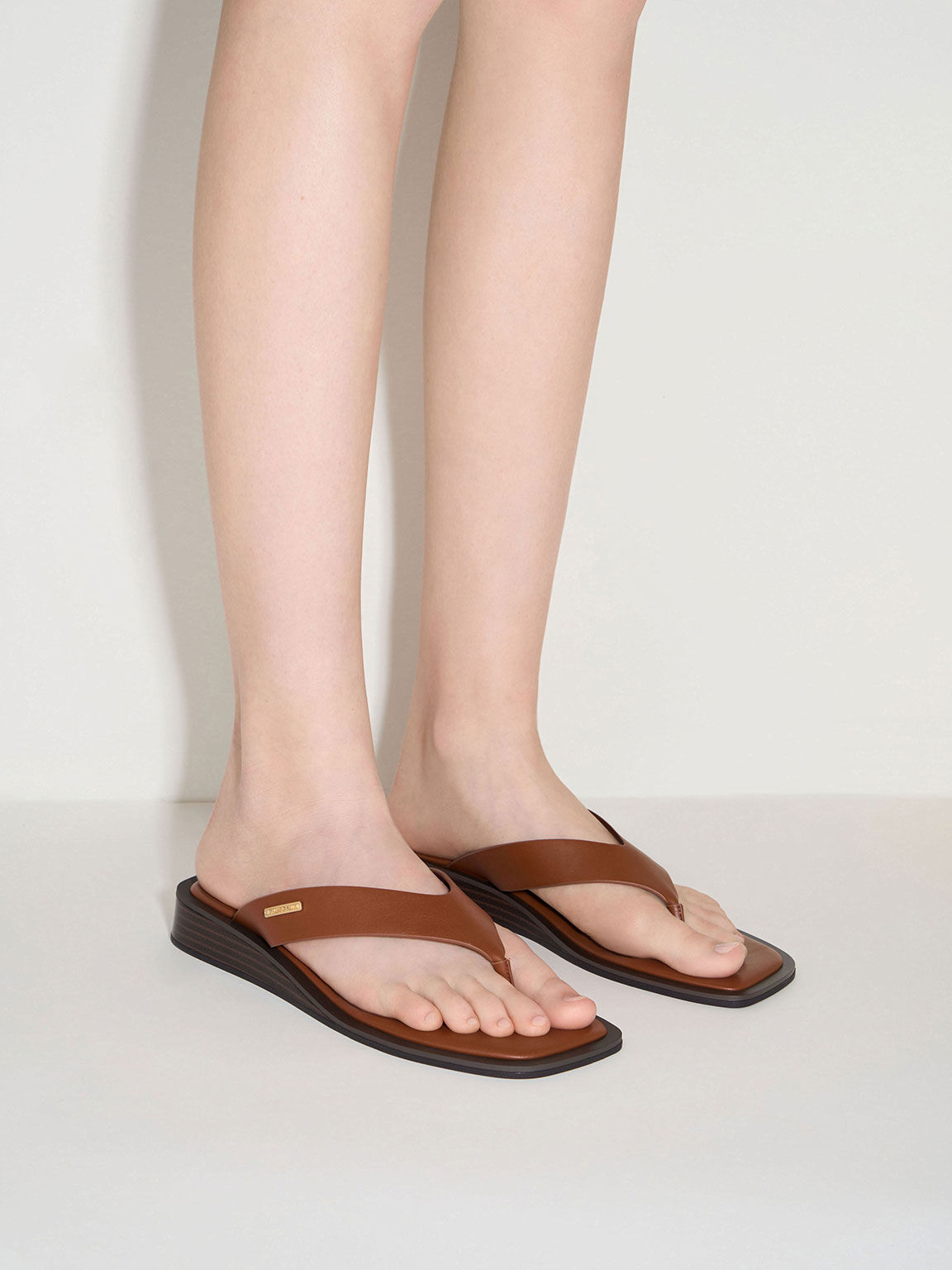 Brown platform flip flops shop
