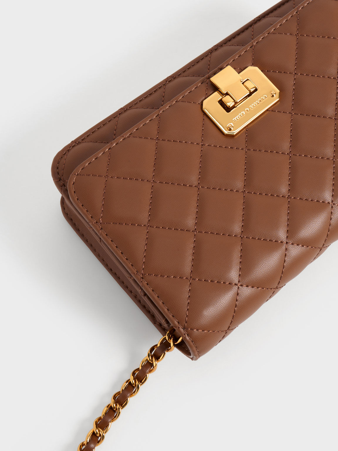 Quilted Push Lock Clutch Chocolate