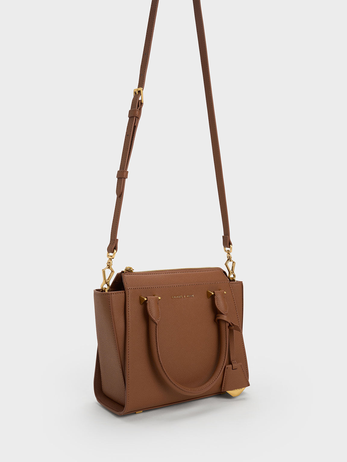 Charles and keith boxy trapeze online bag