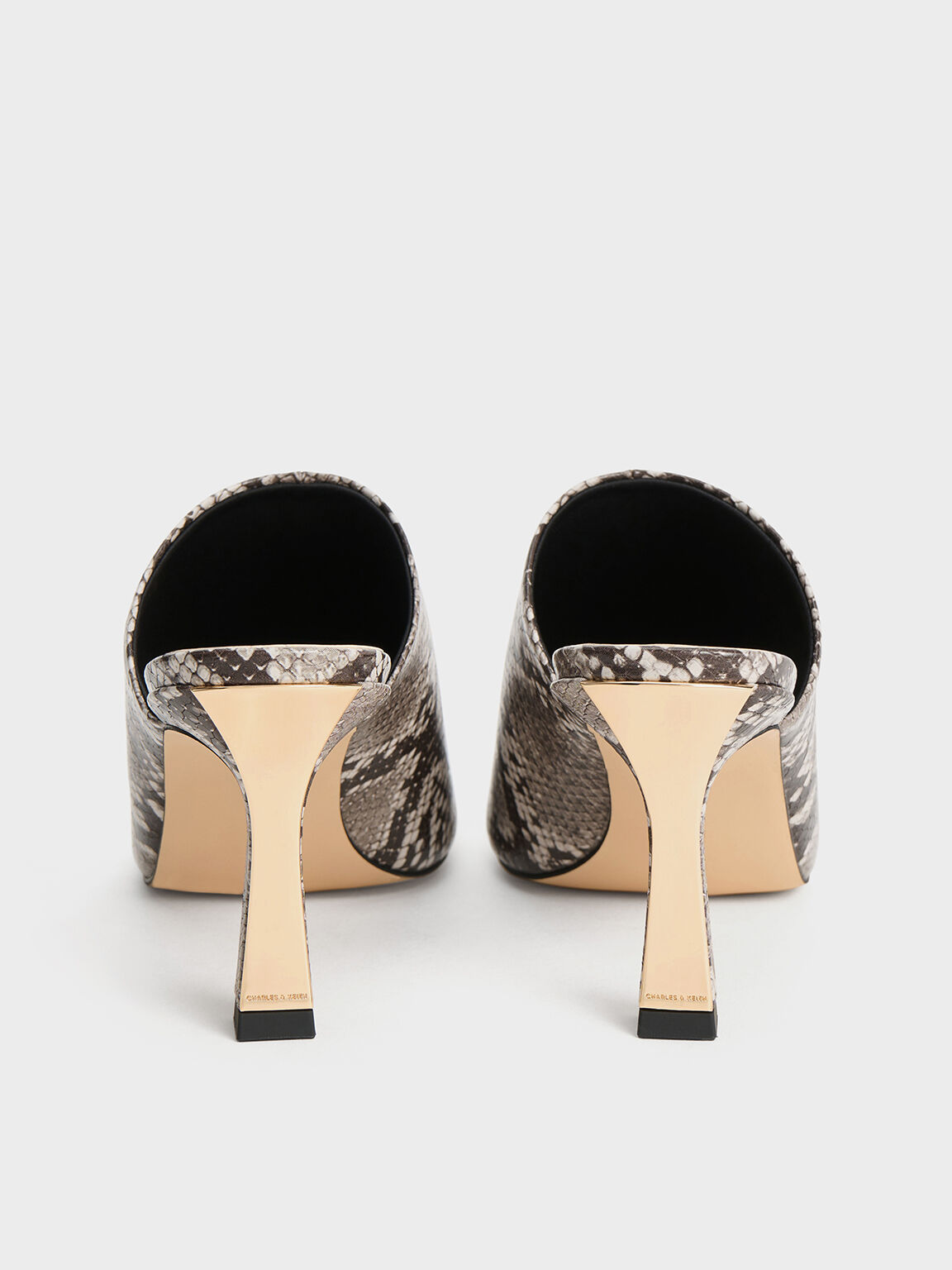 Snakeskin mules on sale