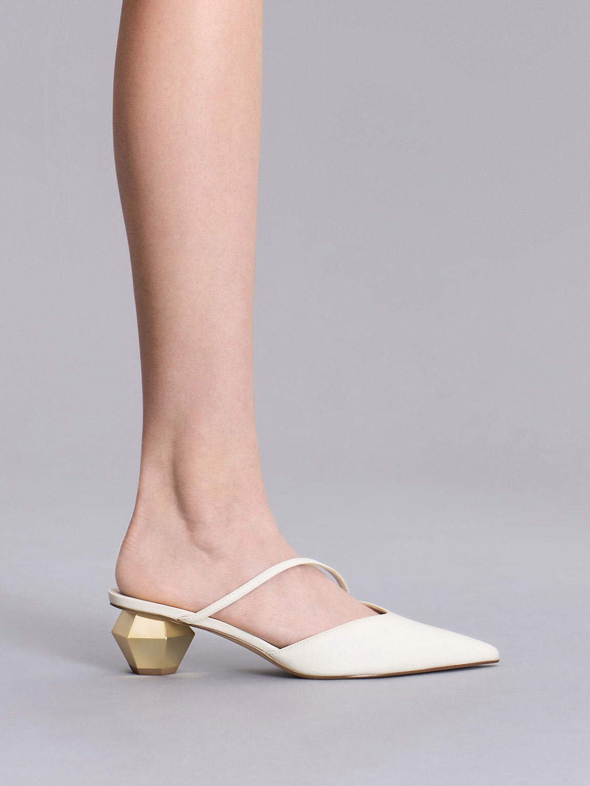 Heeled mules with shop asymmetrical straps