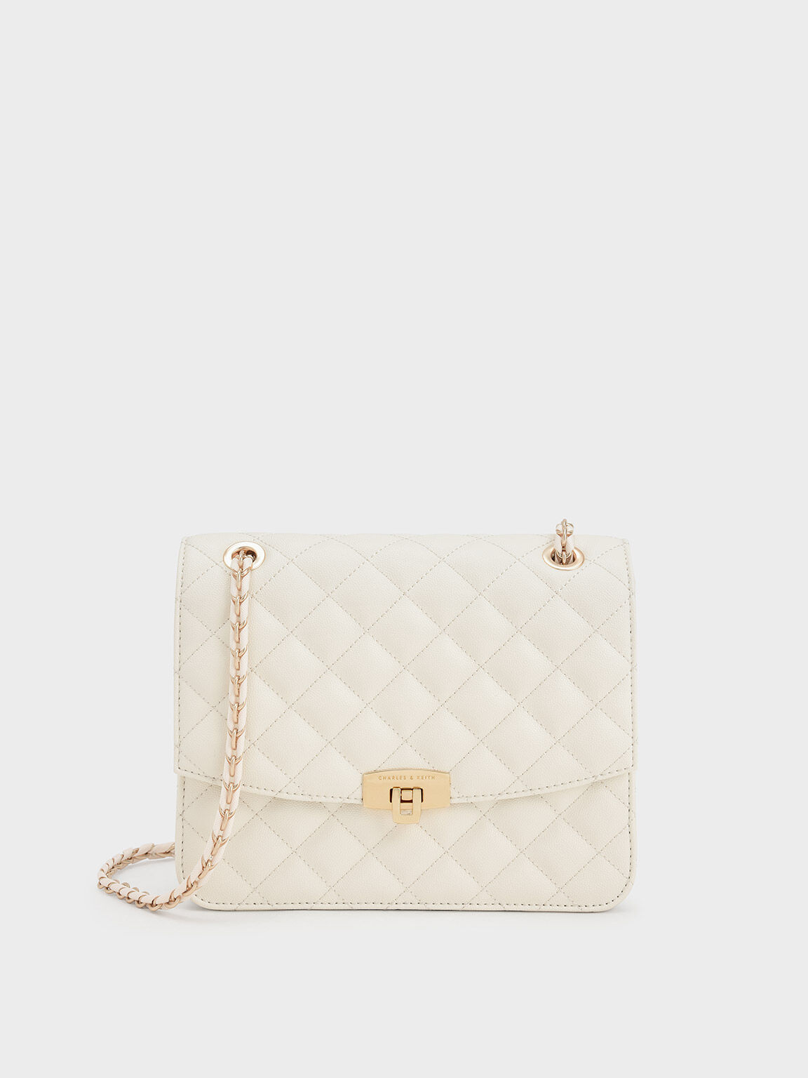 Quilted clutch bag with chain clearance