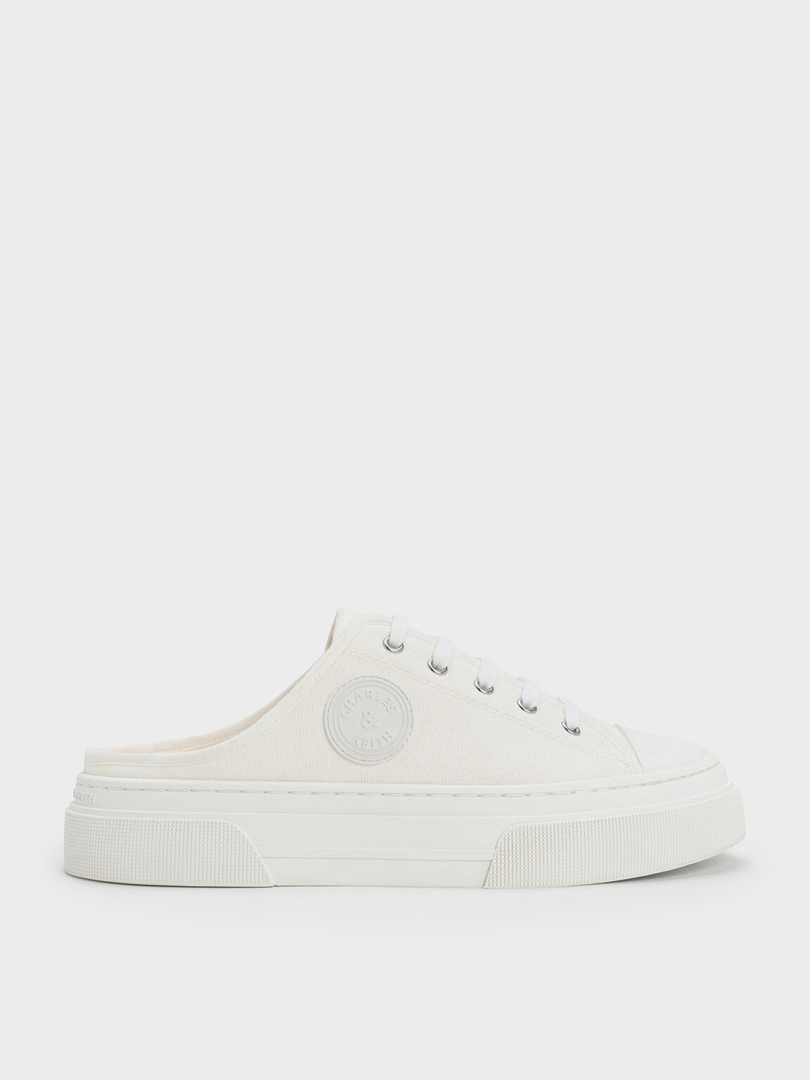 White canvas slip on outlet sneakers