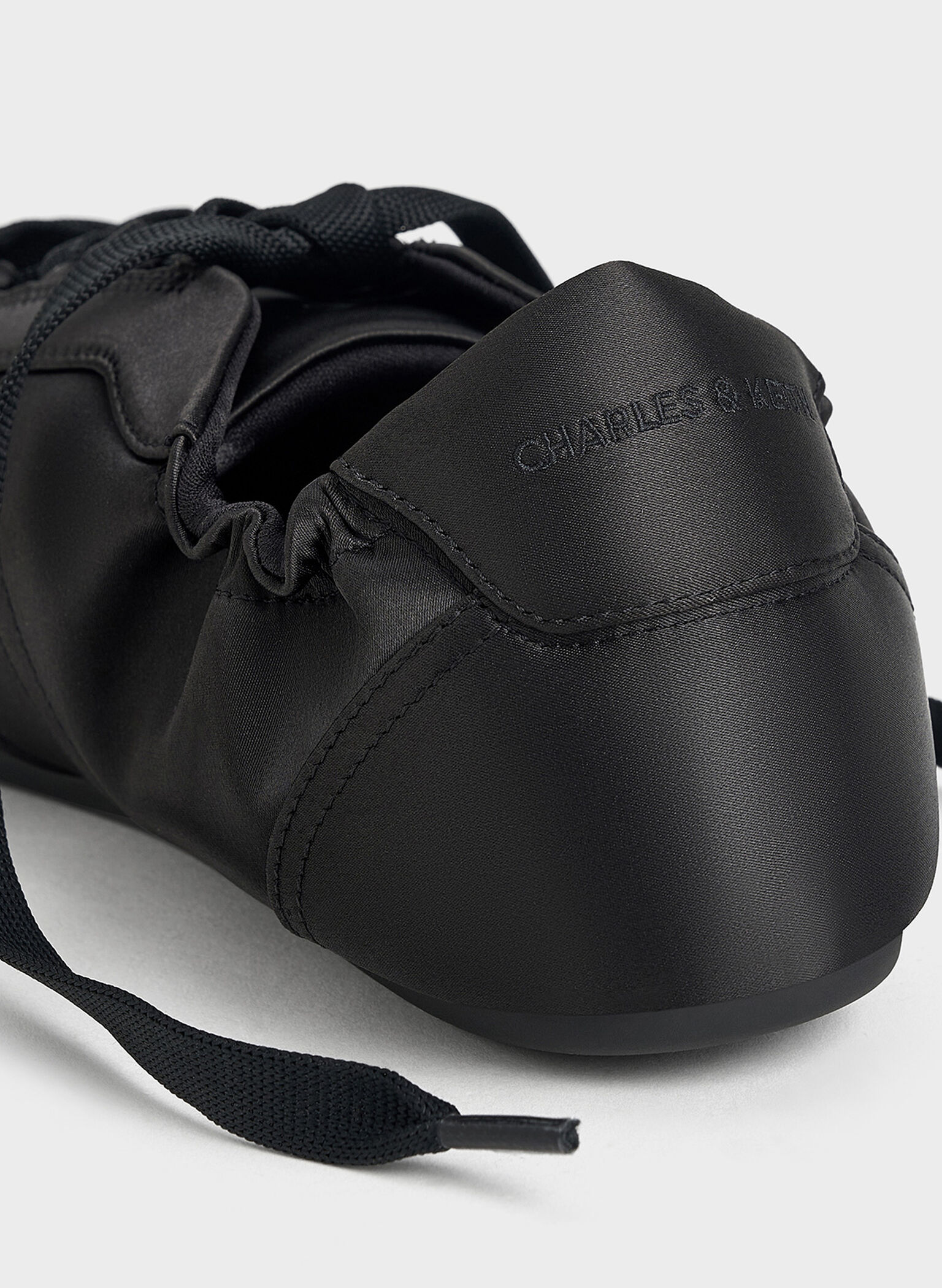 Cece Satin Ruched Bow Sneakers, Black Textured, hi-res