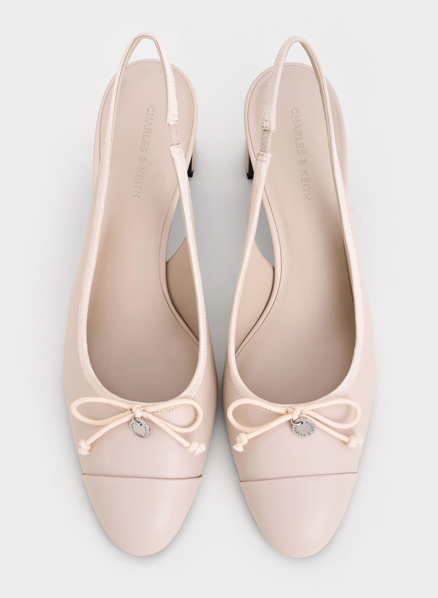 Bow Cap-Toe Slingback Pumps, Cream, hi-res