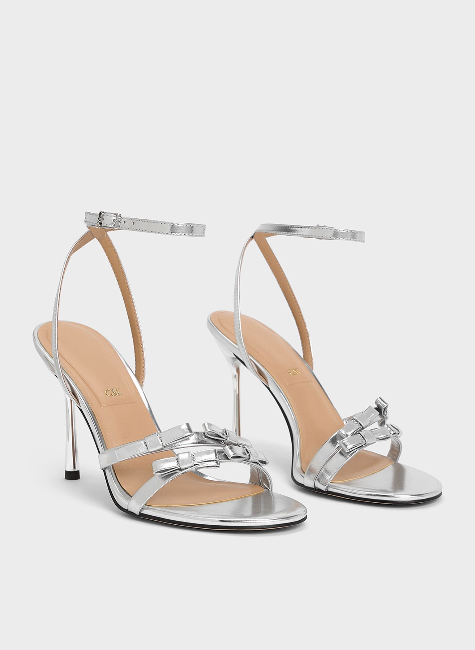 Jessy Metallic Leather Bow Ankle-Strap Stiletto-Heel Sandals, Silver, hi-res