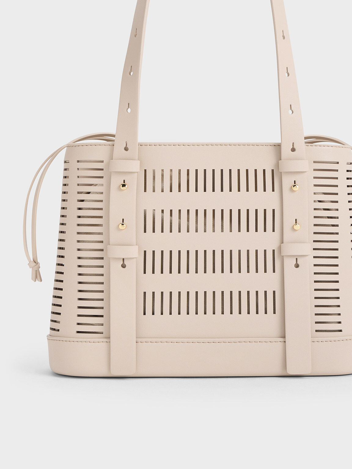 Delphi Cut Out Bucket Bag Oat