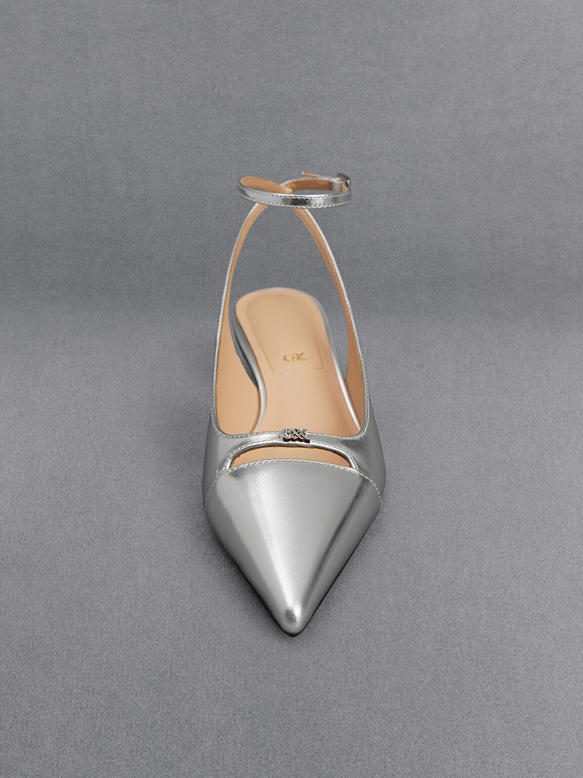 Silver kitten heel pumps top