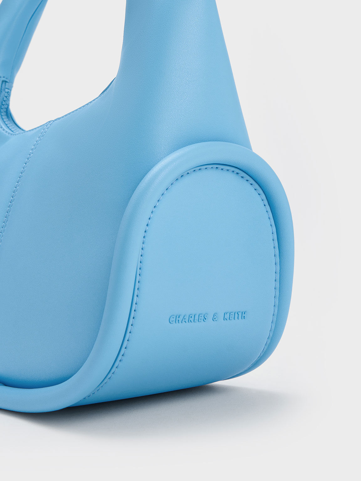 Charles and keith blue handbag 2025