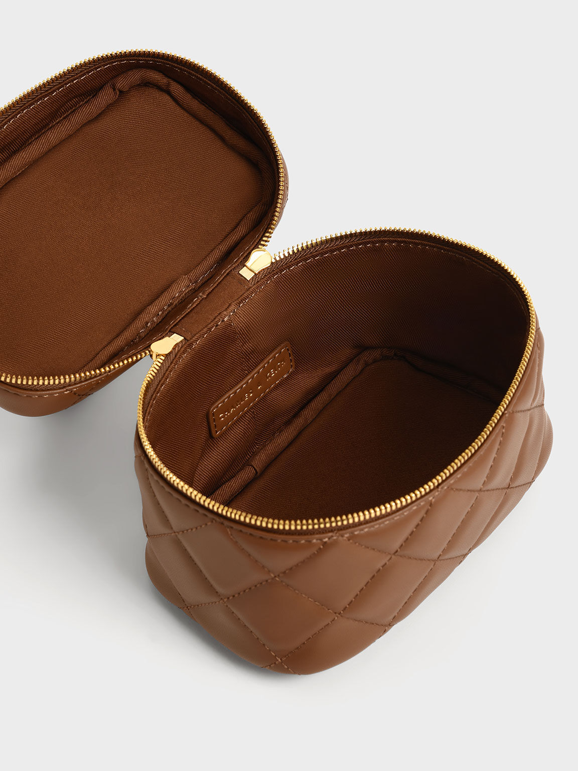 Charles and keith casual zip clearance pouch