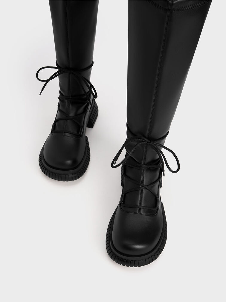 black lace up high boots