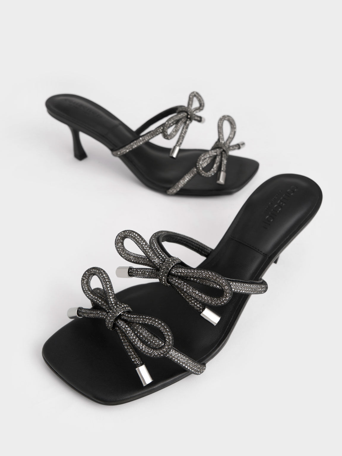 Bow tie shop mules