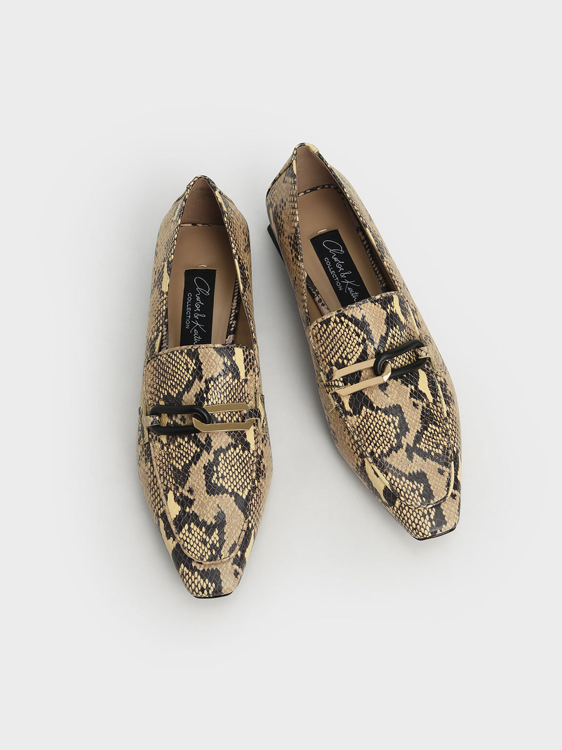 snake print backless loafers