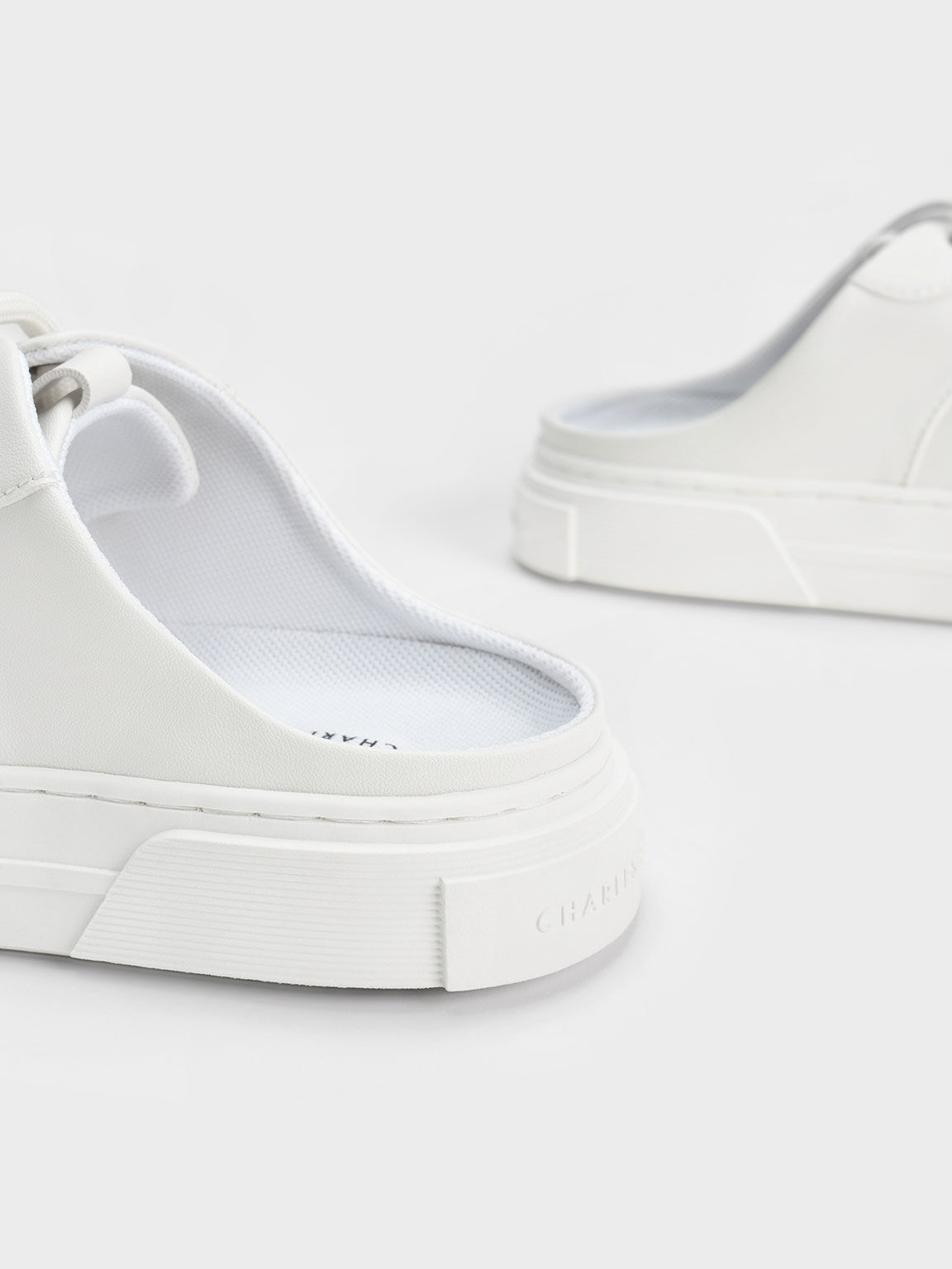 White slide deals on sneakers