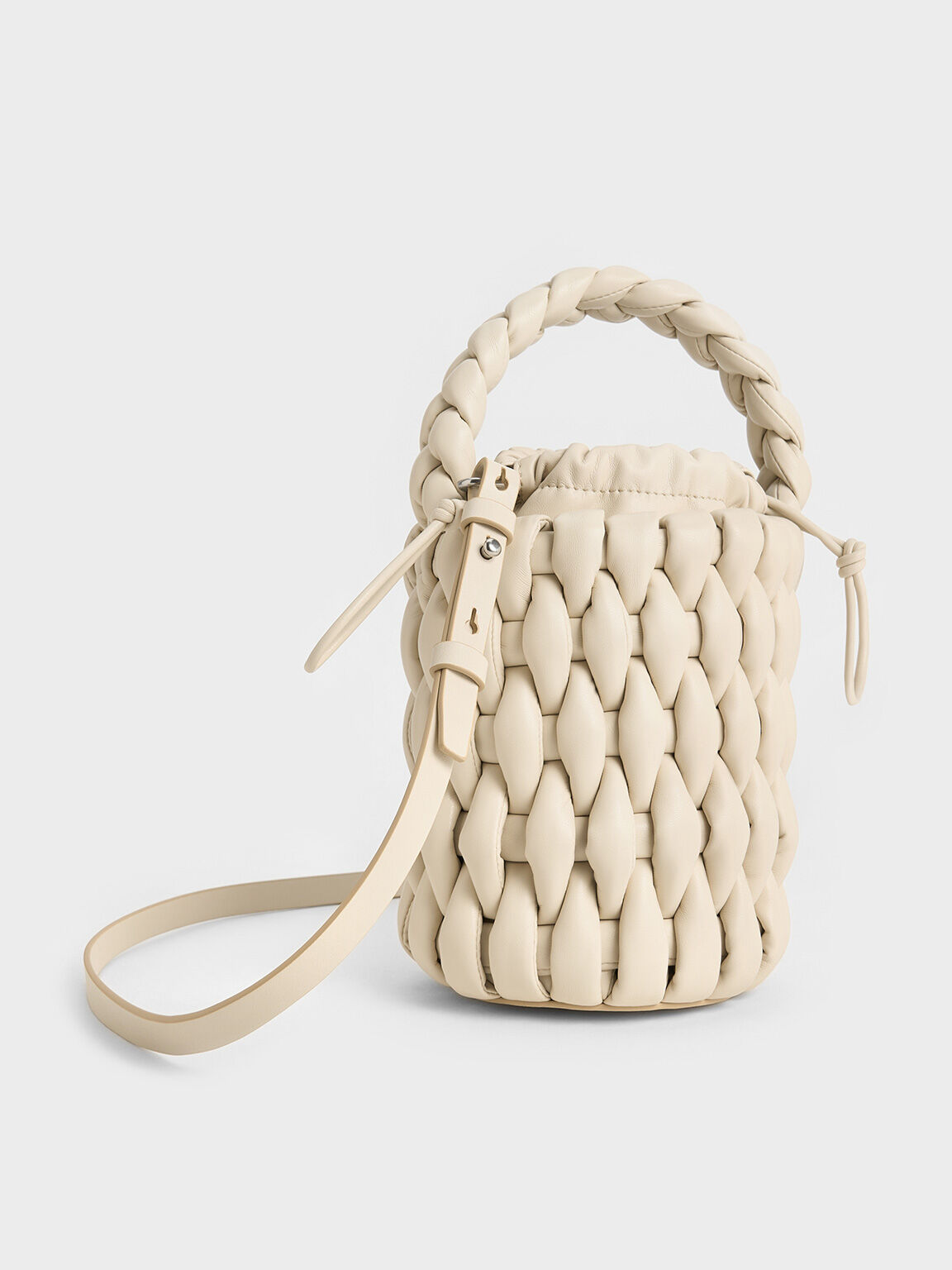 Beige bucket bag store