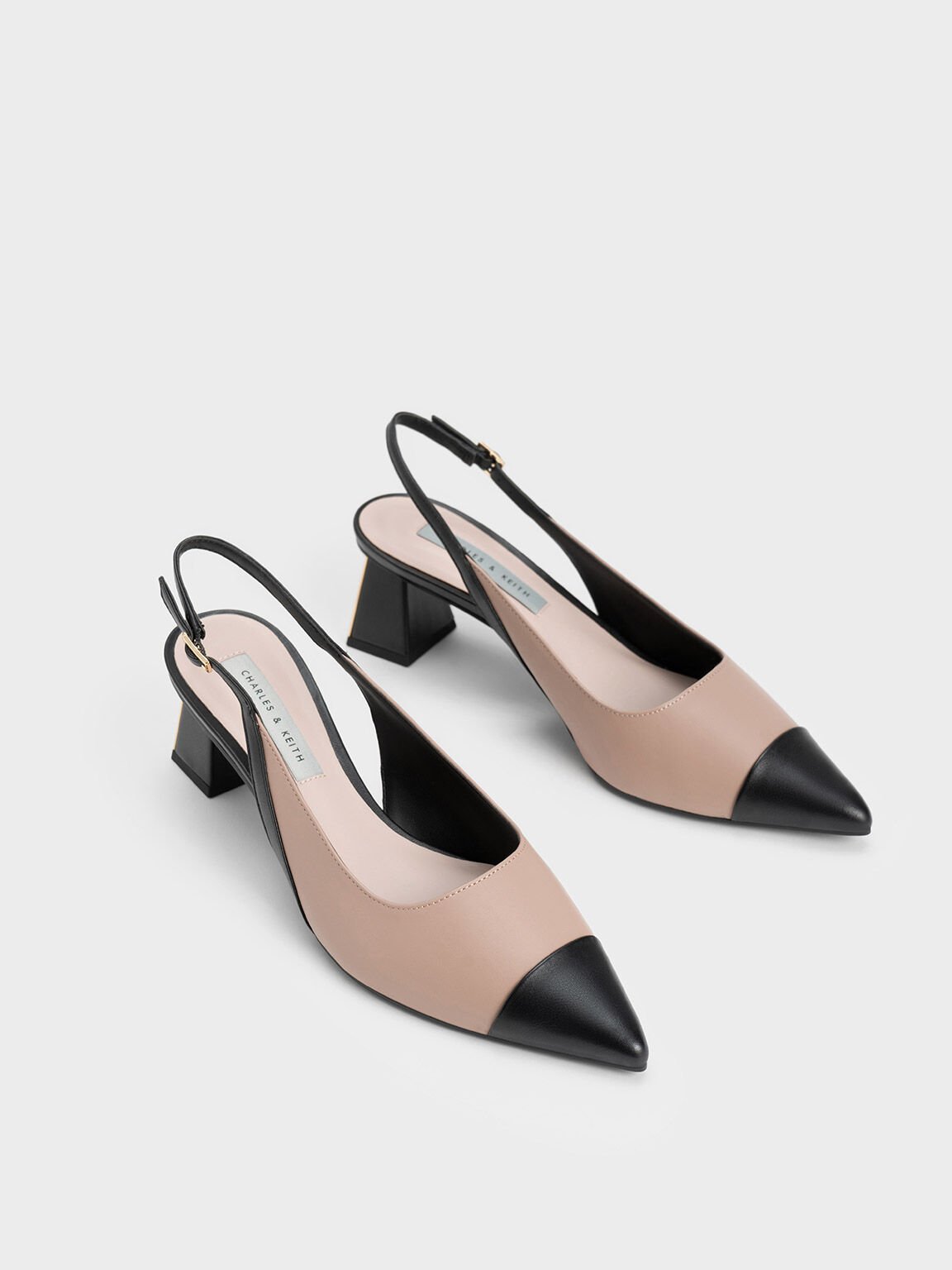 Cap toe slingback sales pumps