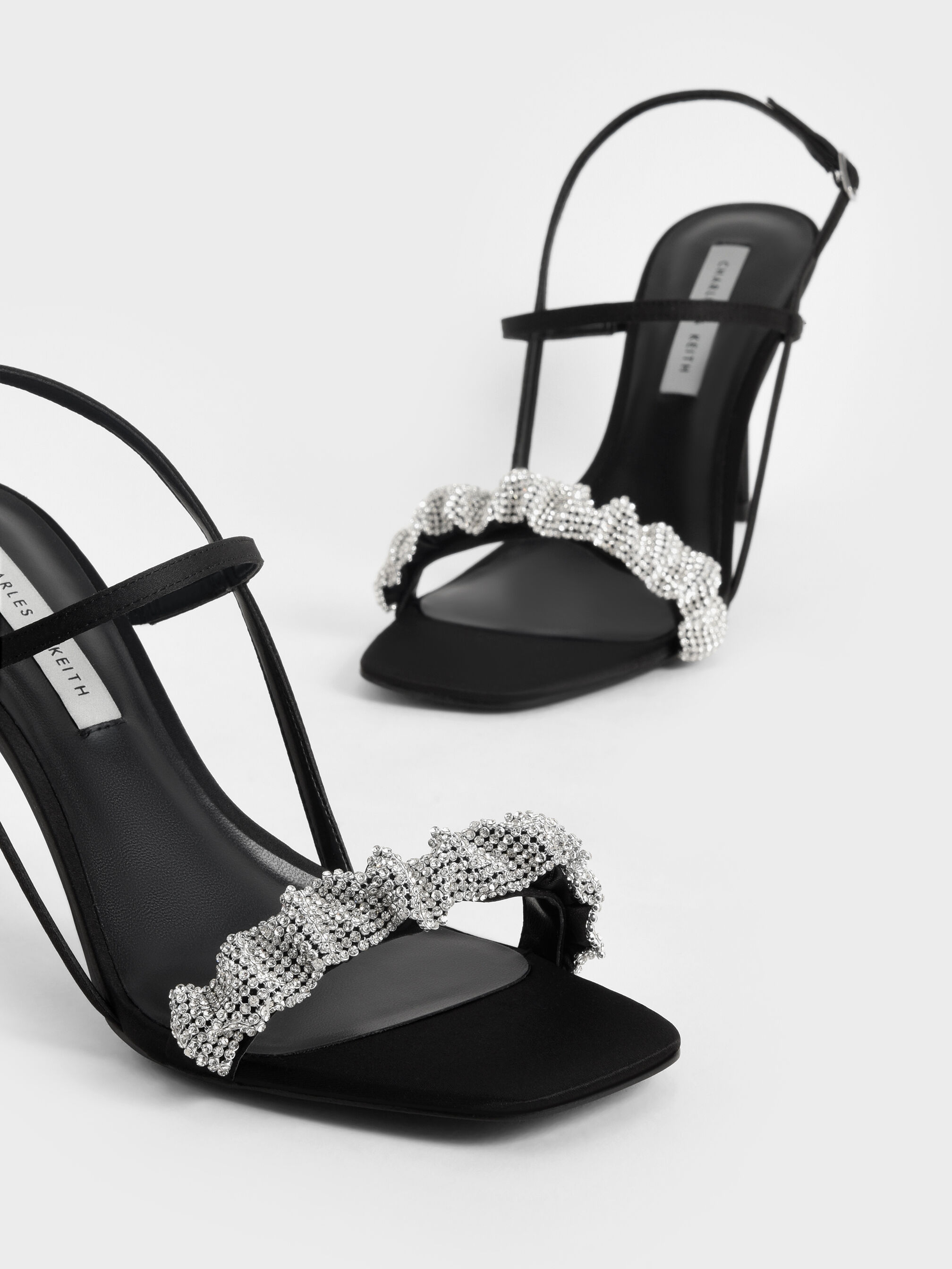 Black strappy stiletto best sale sandals