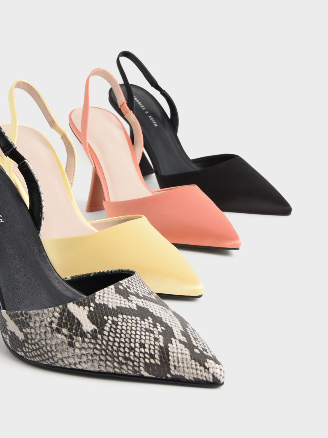 Pointed toe snakeskin heels on sale