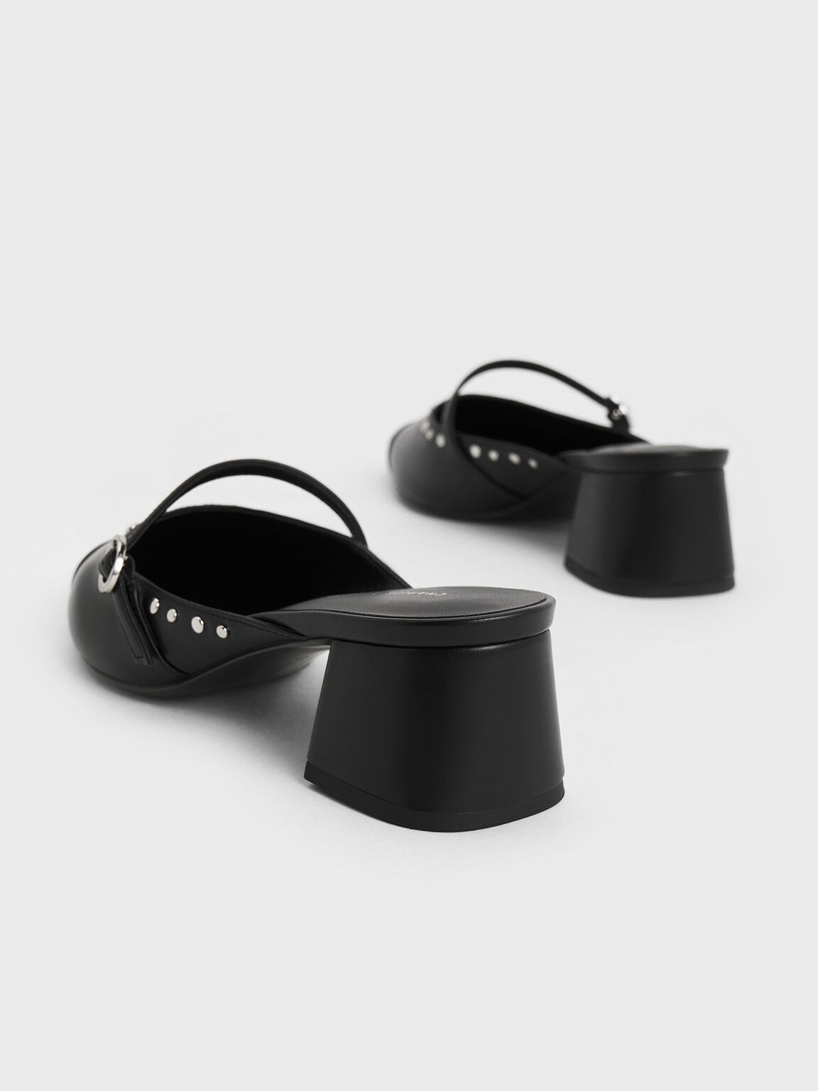 Black mules hot sale with studs