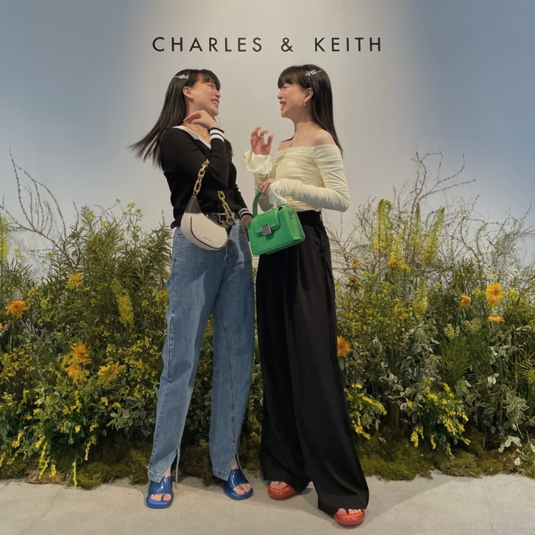 Women’s Shalia chain-handle moon bag and leather metallic accent top handle bag, as seen on Qjin and Qwon - CHARLES & KEITH