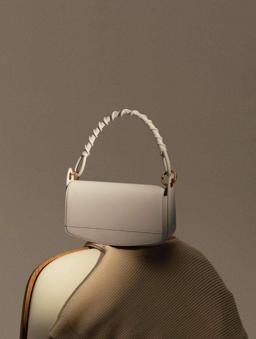 Women’s coiled top handle shoulder bag in cream  - CHARLES & KEITH