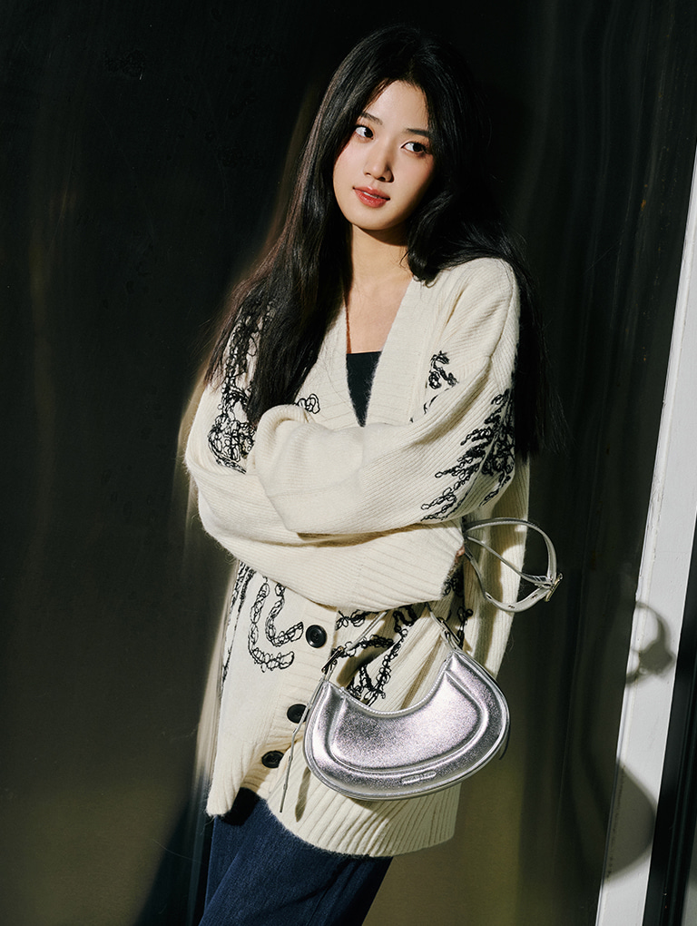 Women’s Petra curved shoulder bag in silver, as seen on Irene Lu Yu Xiao – CHARLES & KEITH