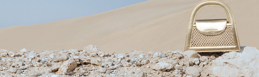 Women's gold Este Metallic Crystal-Embellished Trapeze Bag - CHARLES & KEITH		