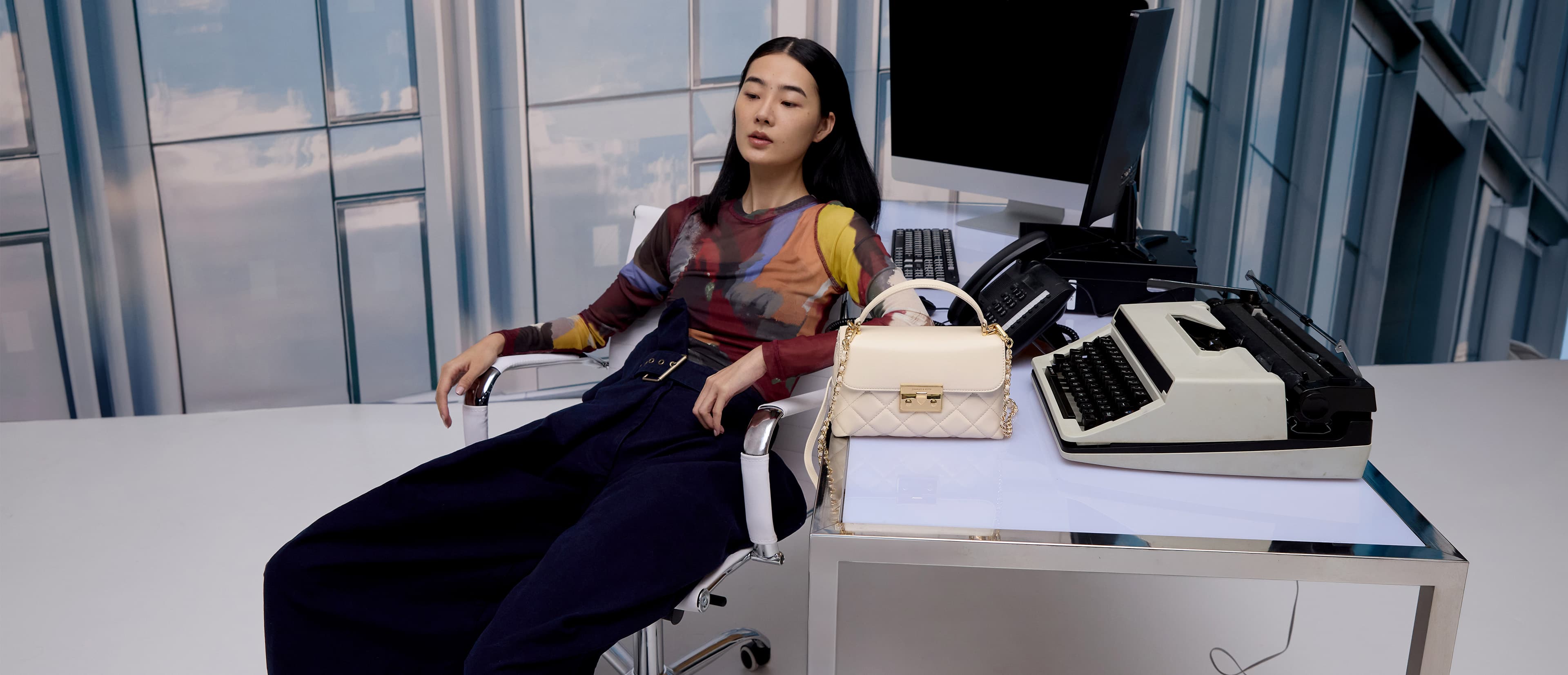 Women’s Alva quilted top handle bag in cream - CHARLES & KEITH