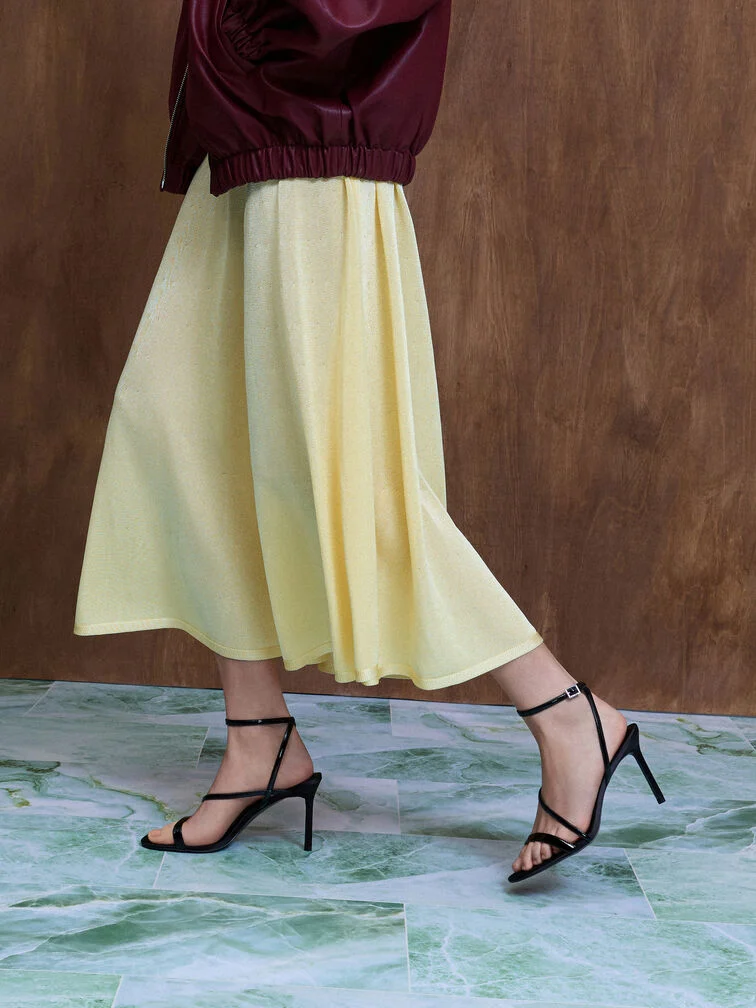 High stiletto heels bring your weight onto the balls of your feet and shifts your centre of gravity.