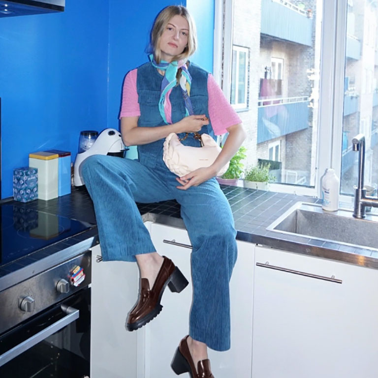 Women’s chain handle braided hobo bag in cream and penny loafer pumps, as seen on Anne Johannsen – CHARLES & KEITH