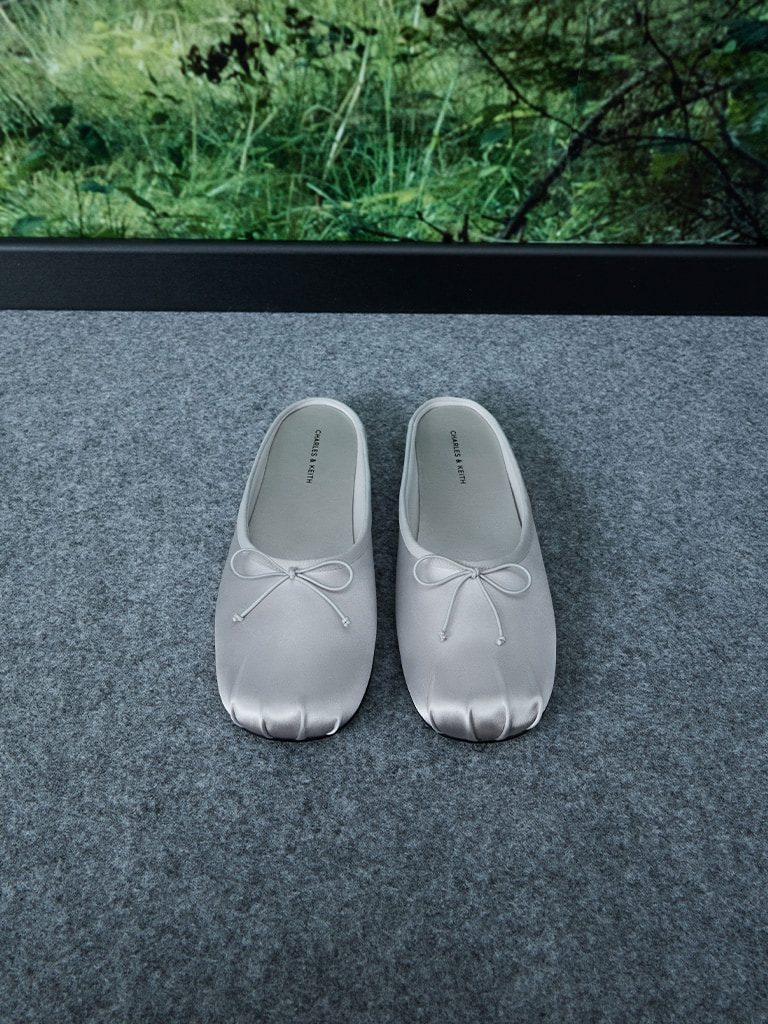 Satin Bow Flat Mules in silver — CHARLES & KEITH