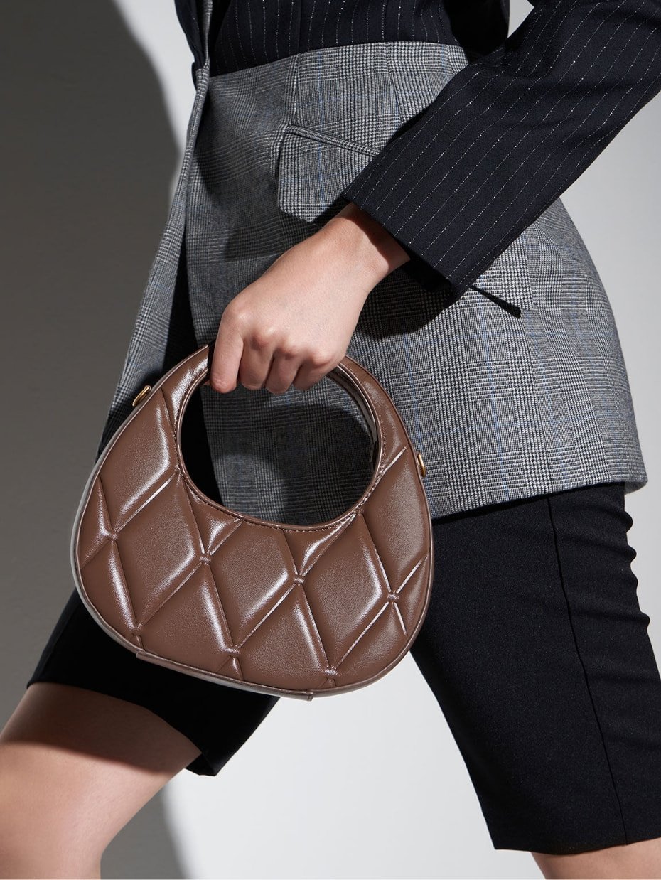 Women’s Candy quilted crescent bag in brown - CHARLES & KEITH