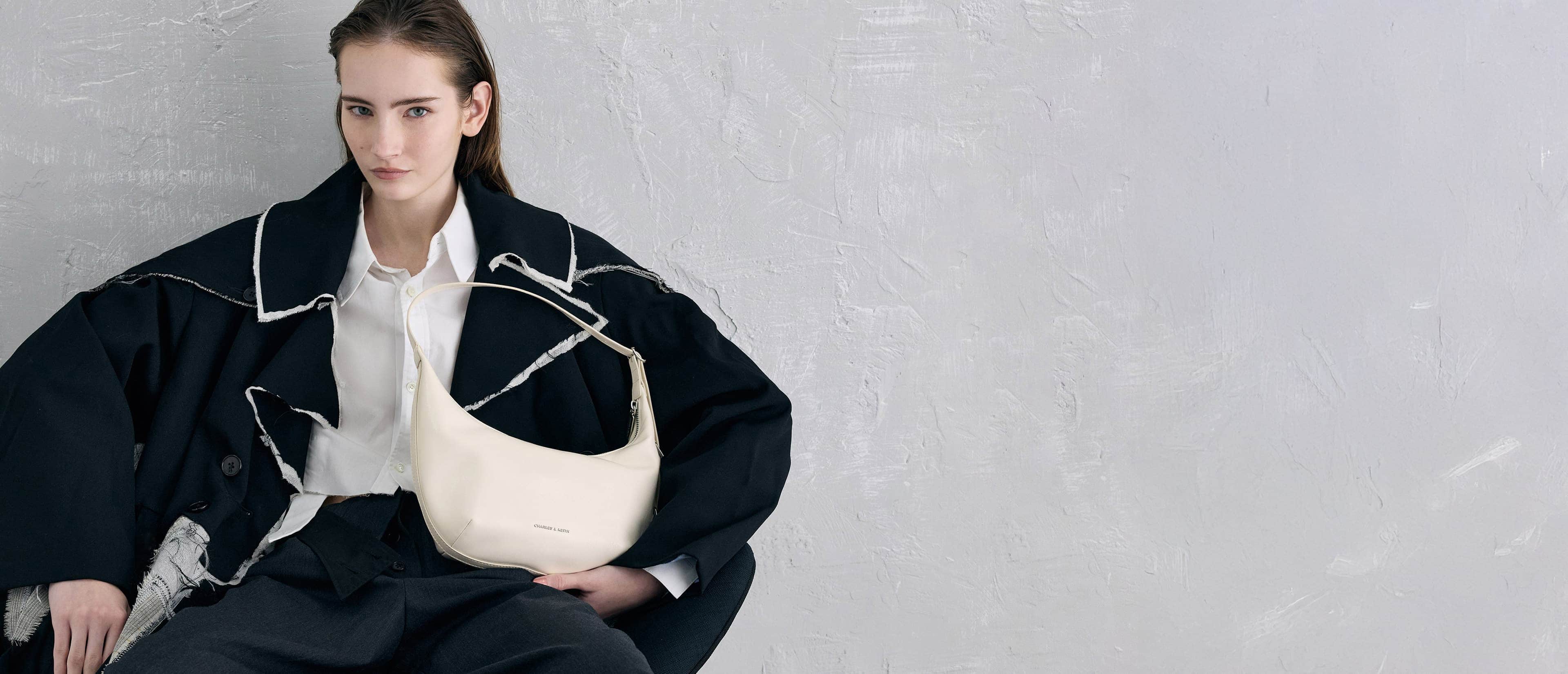 Women’s Bryna Curved Hobo Bag in cream - CHARLES & KEITH